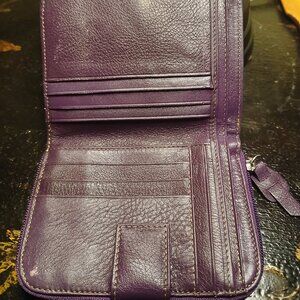 Useful aubergine leather wallet.